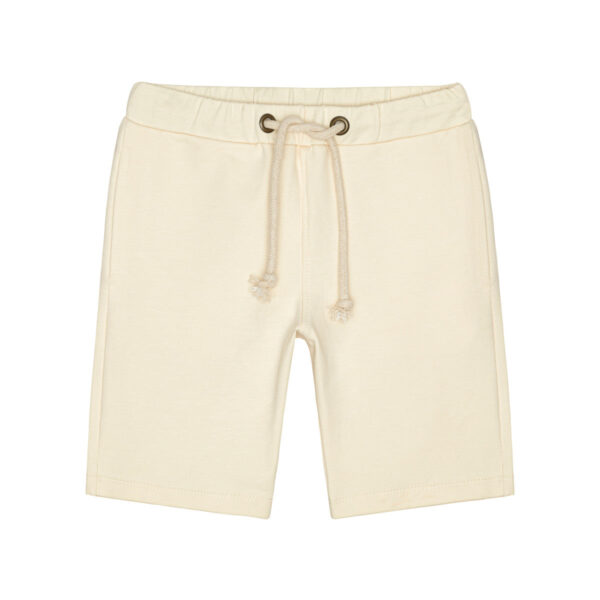 Little Hedonist super comfy organic surfer shorts in Bleached Sand made from our softest organic cotton. Sustainable kids clothing for boys and girls.