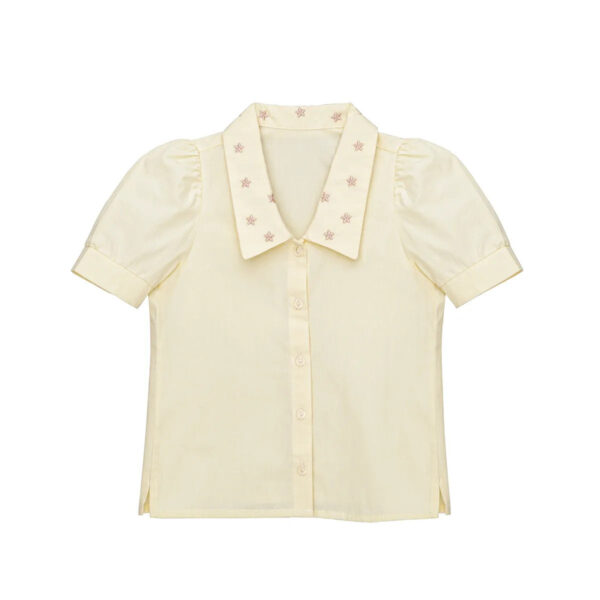 Little Hedonist puff sleeve blouse in Bleached Sand for girls. This button down shirt is made from organic cotton. Sustainable kids clothing.