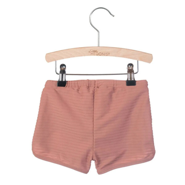 Little Hedonist unisex swim shorts made of recycled polyamide, in Burlwood Pink